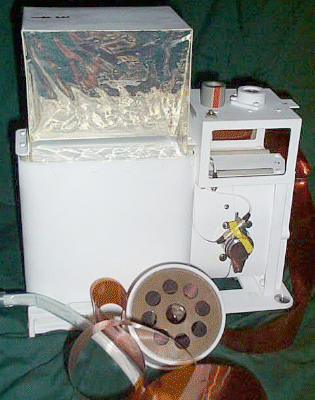 Closeup of the Apollo 13 CCGE, with cable reel in foreground.